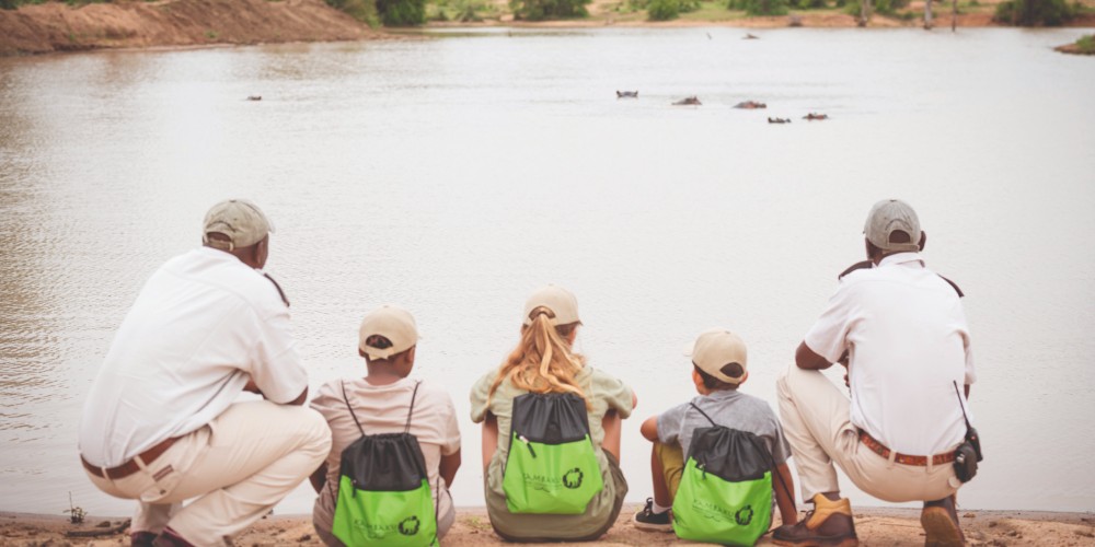 kids-with-rangers-watching-hippos-kambaku-safari-lodge-kruger-national-park