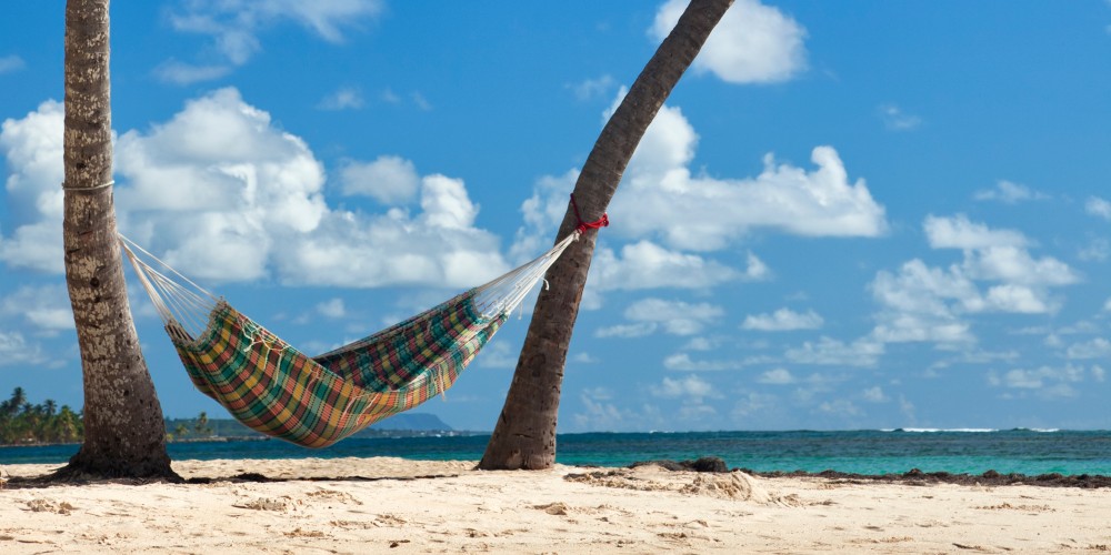 caribbean-holiday-hammock-palm-trees-deserted-beach-guadeloupe