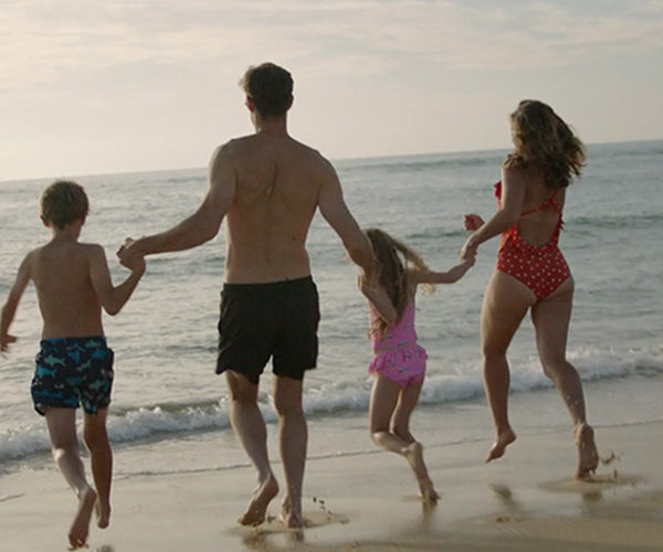 family-of-four-playing-on-beach-brittany-ferries-flexi-ticket-offers-2023