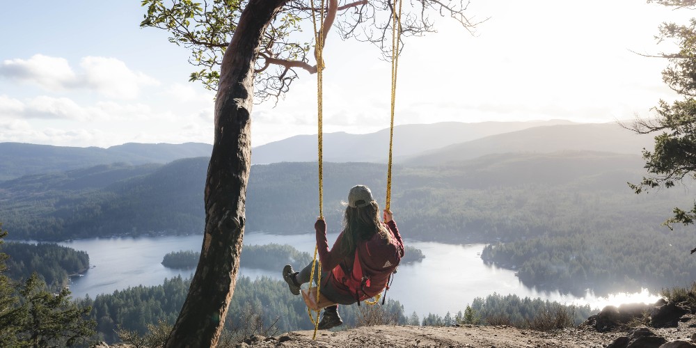 woman-swing-overlooking-shawnigan-lake-vancouver-island-tourism-cowichan-peter-ohara