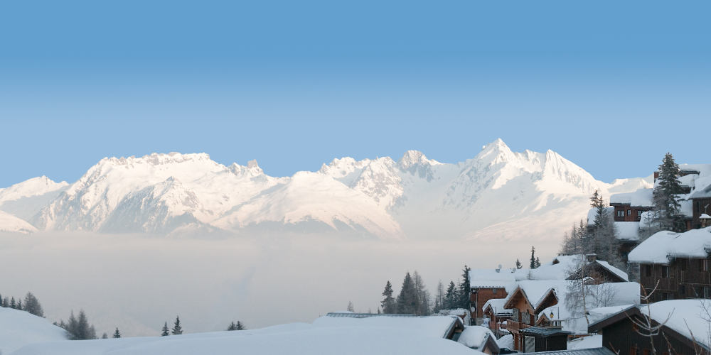 snow-covered-mountains-chalets-la-plagne-ski-resorts-france