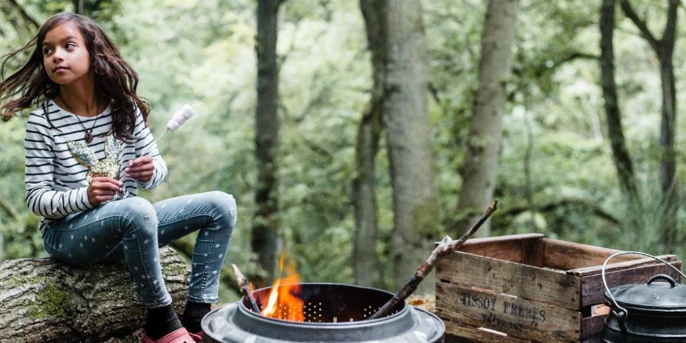 drovers-rest-hay-on-wye-uk-weekend-break-girl-toasting-marshmallows-in-woods
