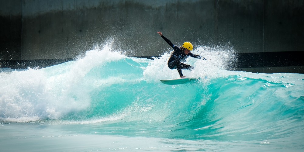 boy-surfing-the-wave-croyde-bay-bristol-unsplash