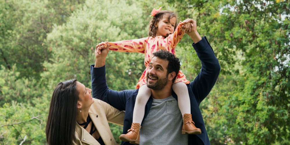 family-with-little-girl-in-forest