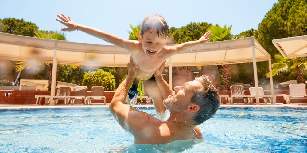 father-child-swimming-pool-activity-holidays-nobilis-resort-turkey