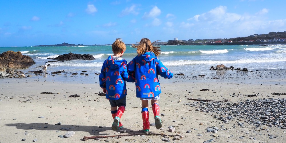 kids-on-beach-muddy-puddles-clothing-back-view