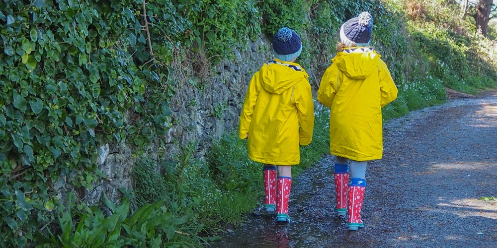 muddy-puddles-rainwear-girls-on-country-walk