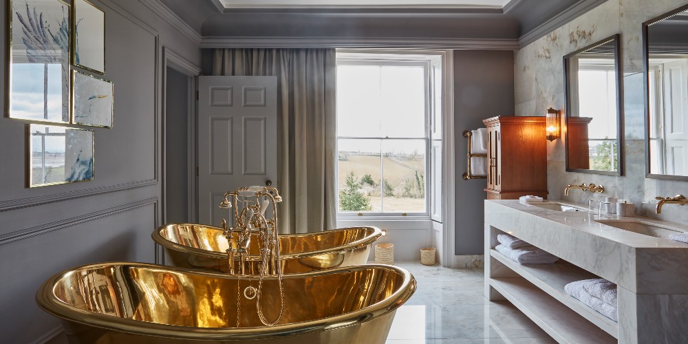 bathroom-with-twin-copper-baths-lympstone-manor-devon