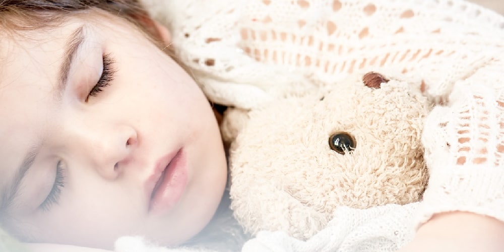 girl-sleeping with teddy