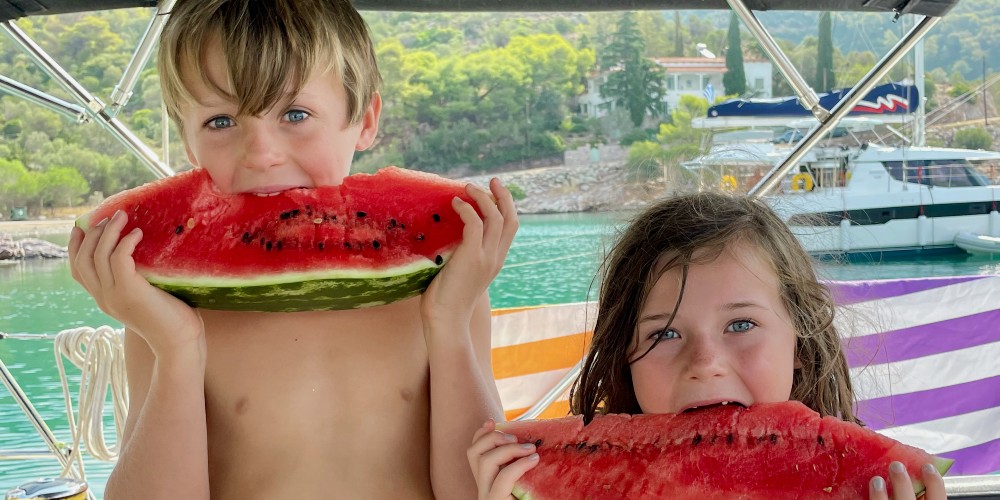 eating-watermelon-russian-bay-poros-greek-sailing-holidays