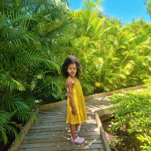 little-girl-yellow-dress-mauritius-flight-centre-holiday