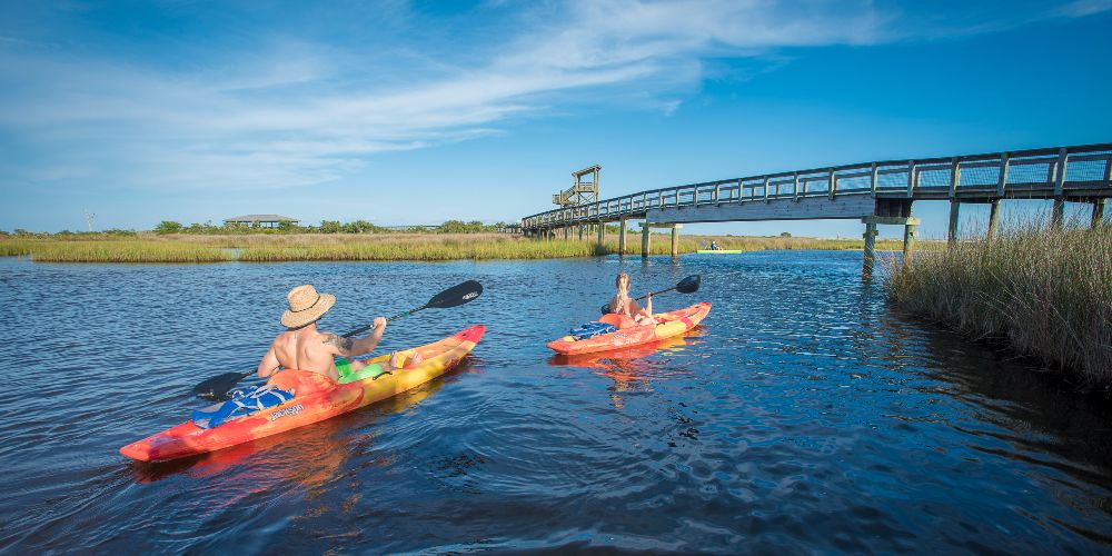 family-kayaking-big-lagoon-state-park
