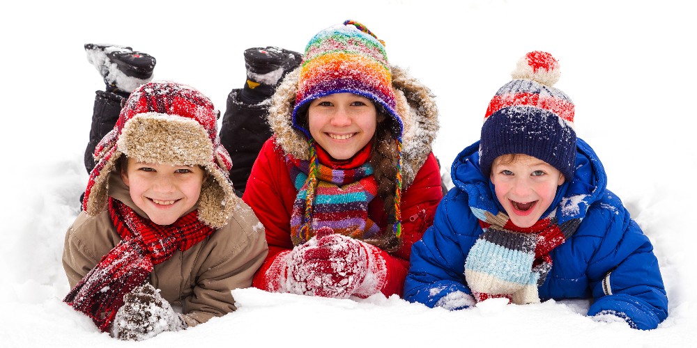 three-children-in-snow-winter-holiday
