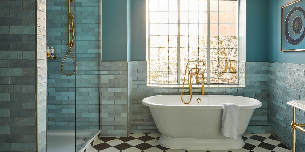bathroom-blue-tiled-roll-top-bath