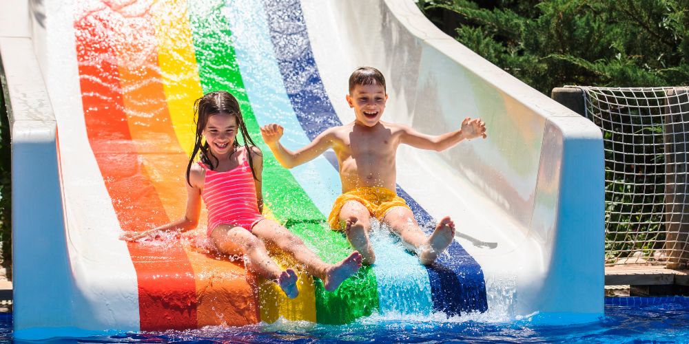 children-on-colourful-slide-waterpark-hillside-beach-club-turkey