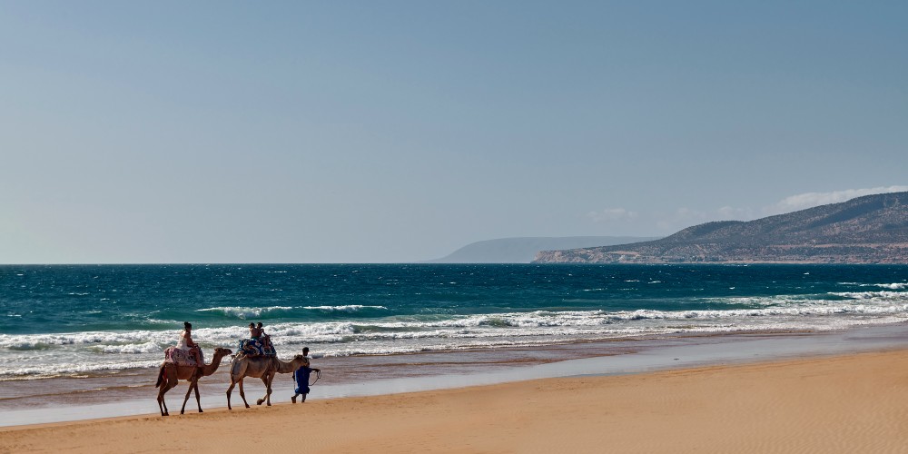 camels-and-riders-on-atlantic-beach