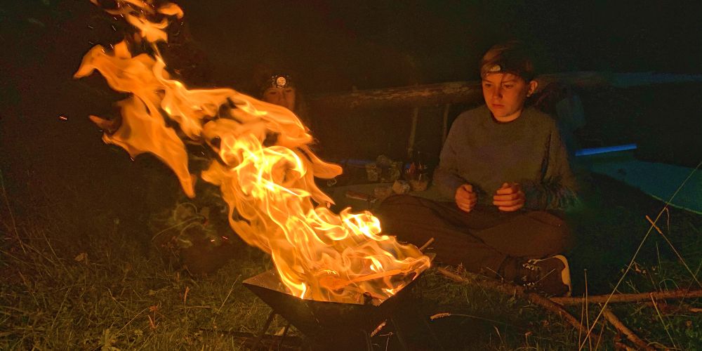 children-and-wild-camping-campfire-avoriaz