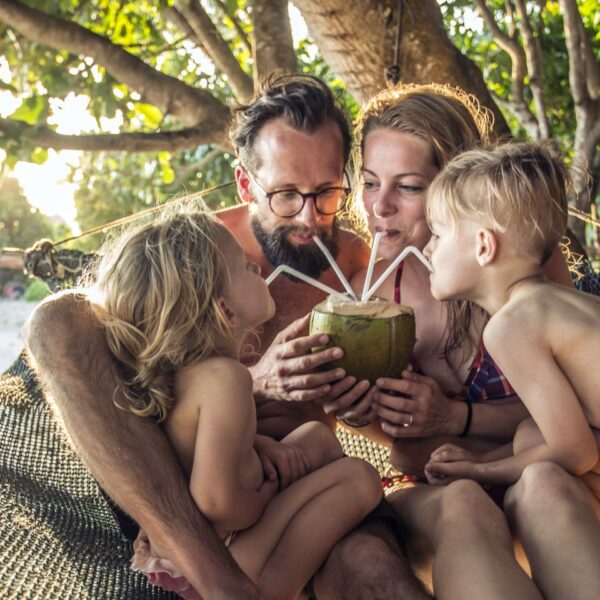 family-drinking-coconut-water-kuoni-holidays