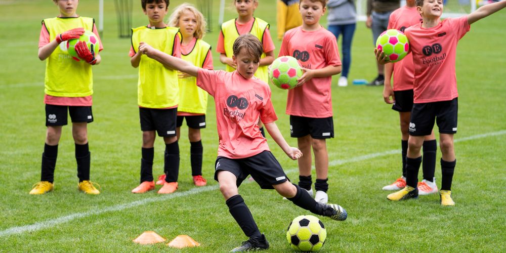 children-playing-football-the-grove-hotel