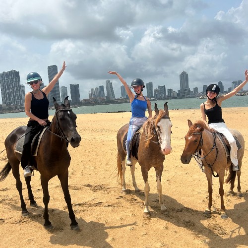 women-riding-on-beach-colombo