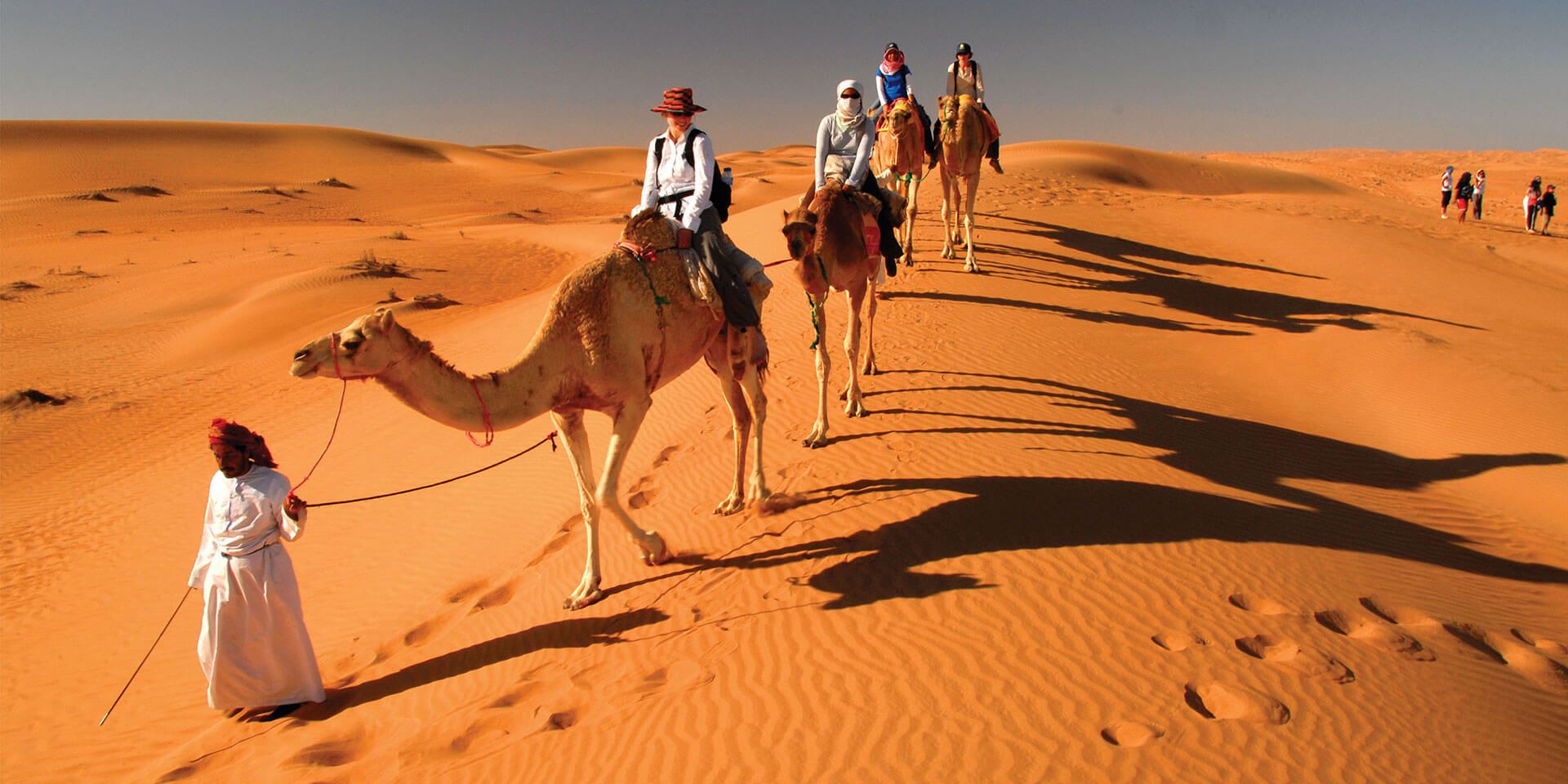 camel-riding-desert-oman