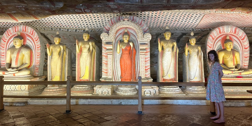 girl-in-dambulla-cave-sri-lanka