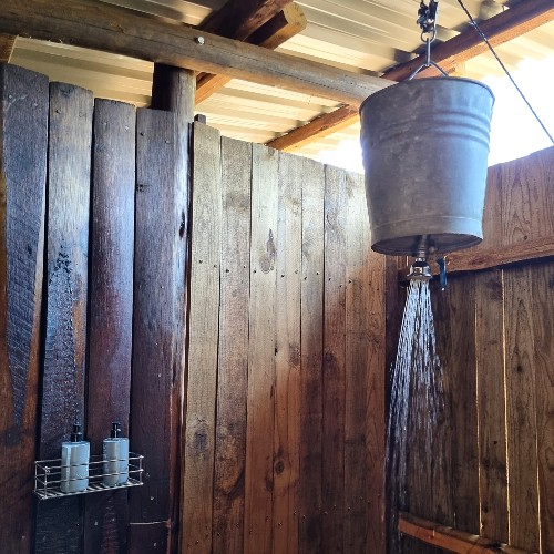 bucket-shower-mosetlha-bush-camp