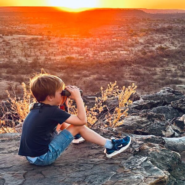 child-sunset-first-family-safari-botswana