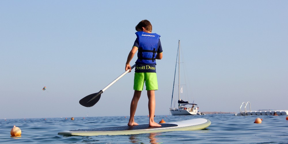 child-paddleboarding-eagles-resort-halkidiki