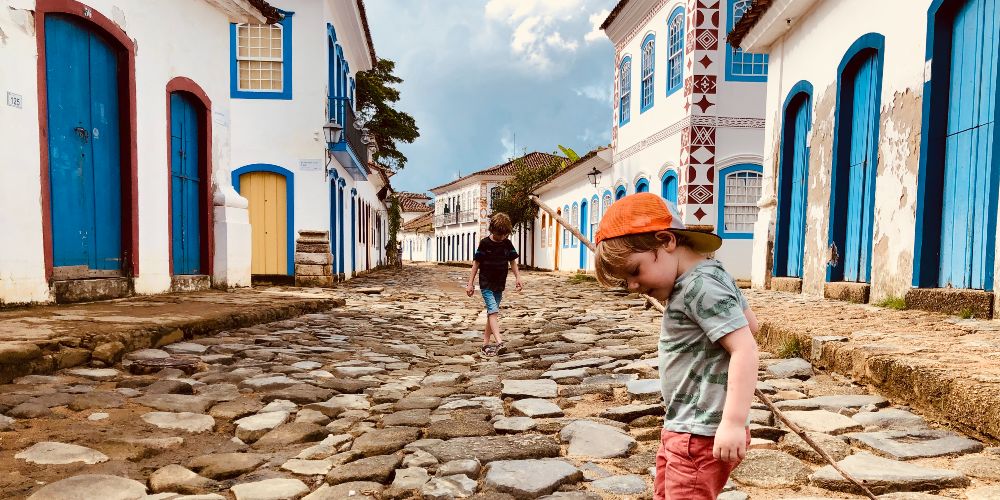 children-cobbled-streets-paraty-brazil-journey-latin-america