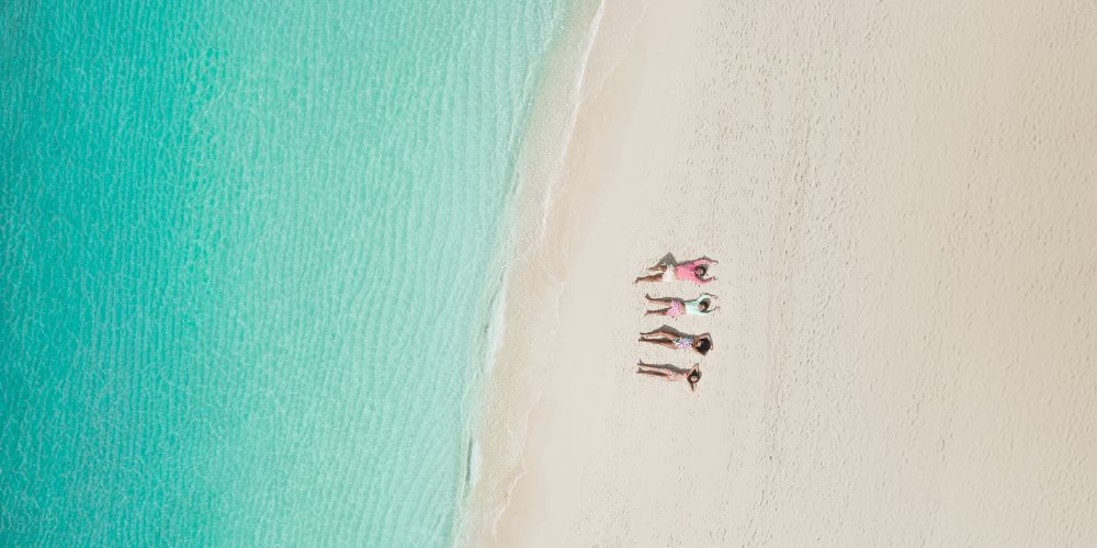 children-on-grace-bay-beaches-turks-and-caicos