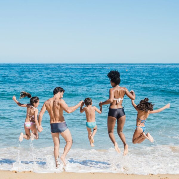 holiday-in-corsica-family-playing-in-sea