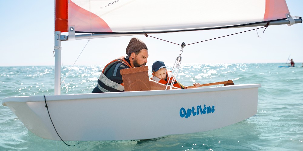 very-young-children-learning-to-sail-dinghy-mediterranean