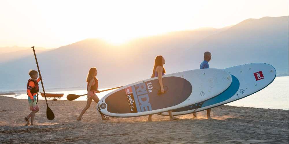 family-paddleboarding-neilson-beach-clubs