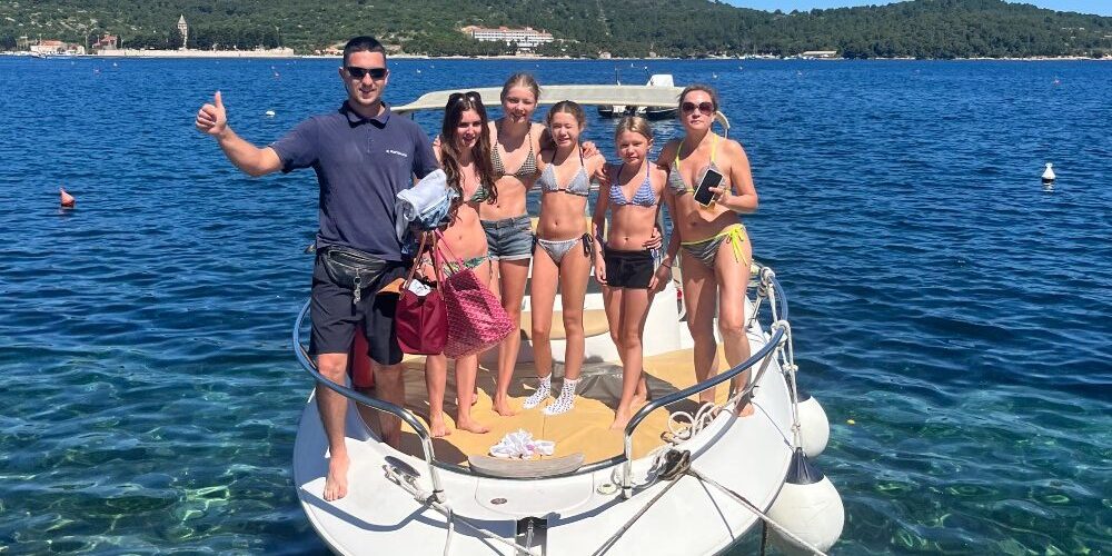 family-on-boat-vis-island-croatia-family-holiday