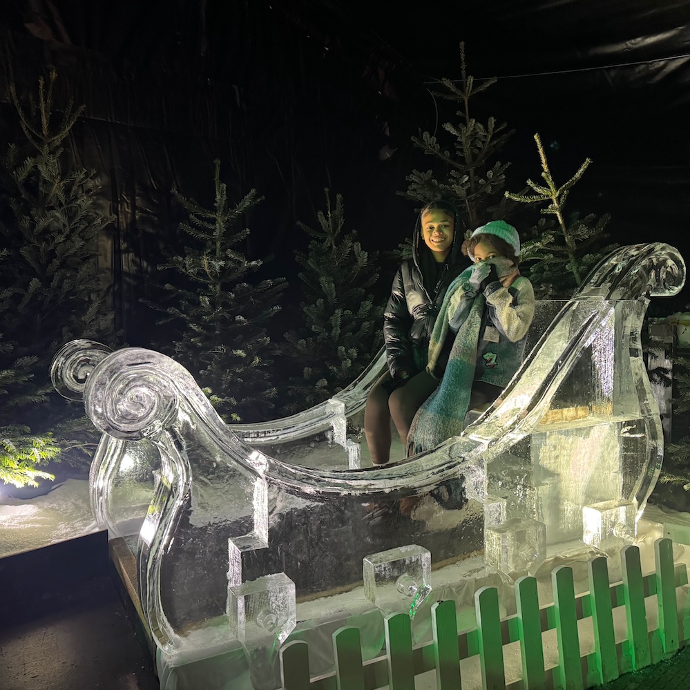 children-on-ice-sculpture-sleigh