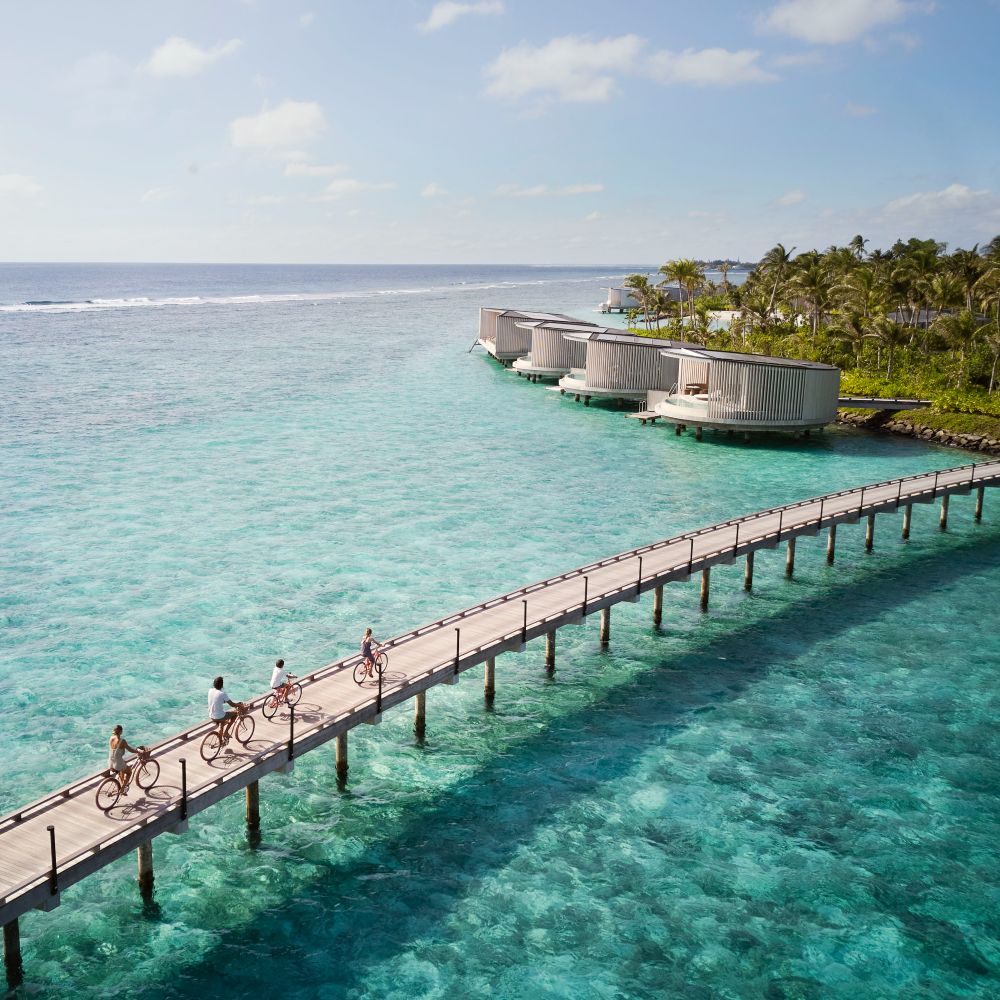 family-cycling-the-ritz-carlton-maldives