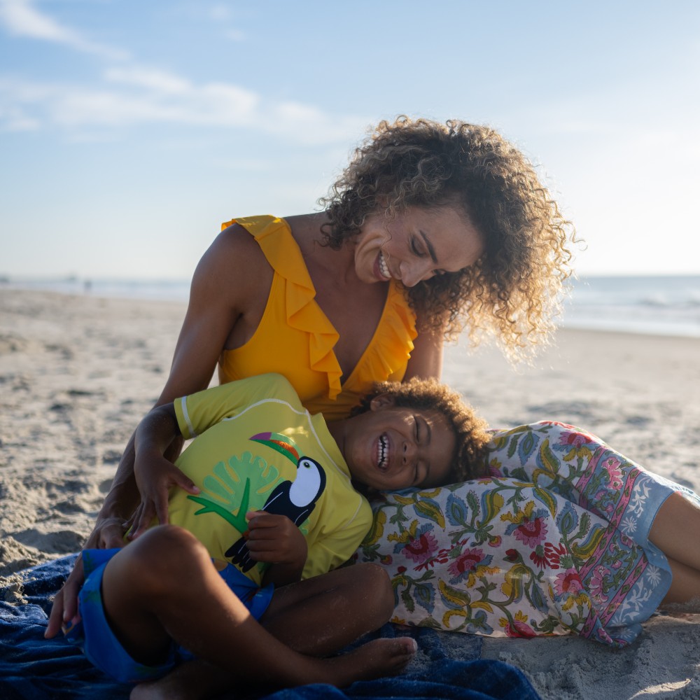 child-mother-beach-space-coast-family-holidays