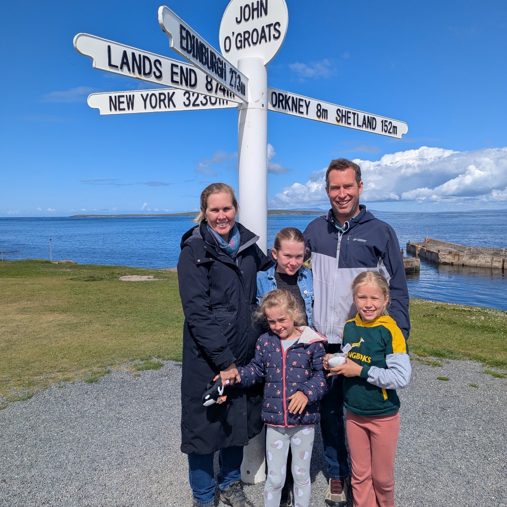 family-john-o-groats-sign-northern-scotland