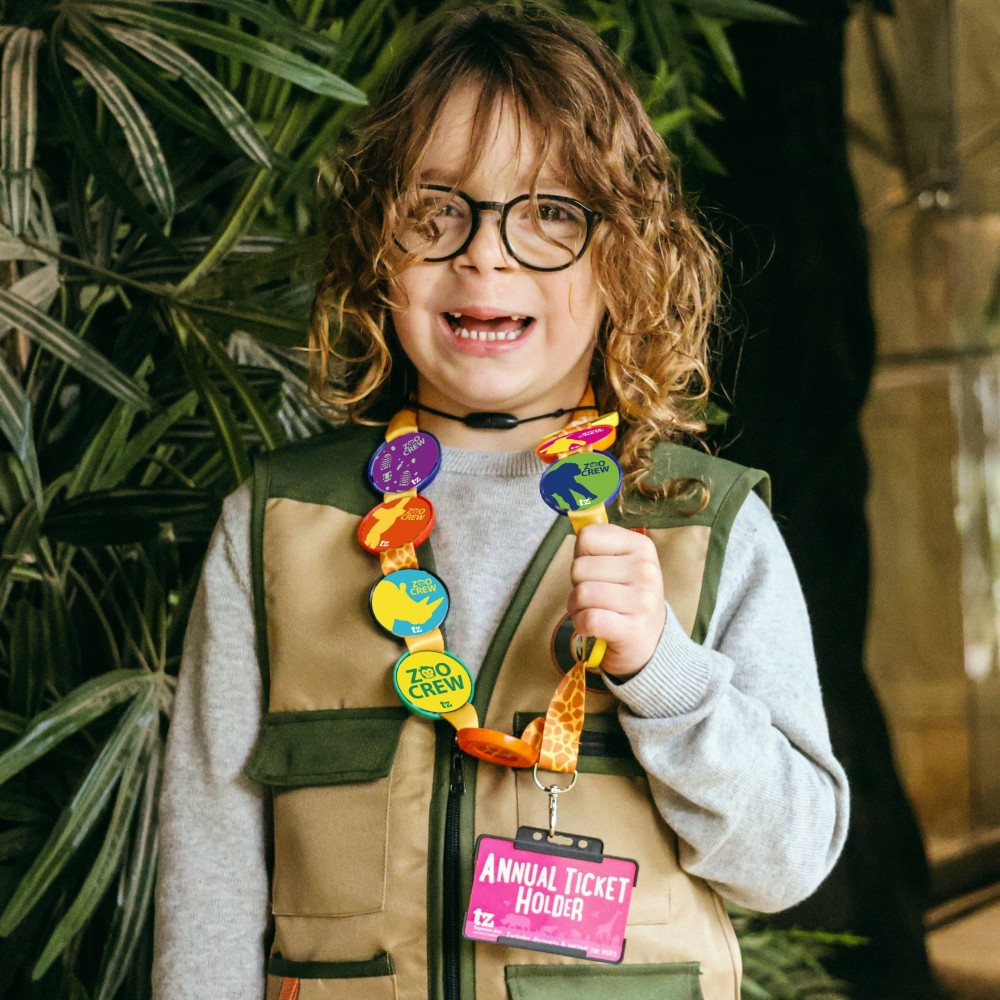 zoo-crew-kid-with-badges