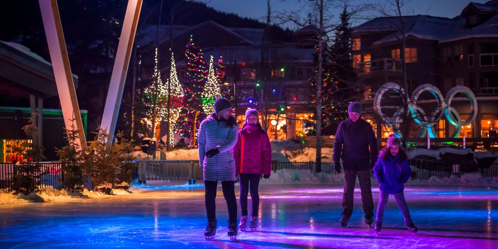 family-skating-olympic-plaza-whistler-bucket-list-snow-season-2021