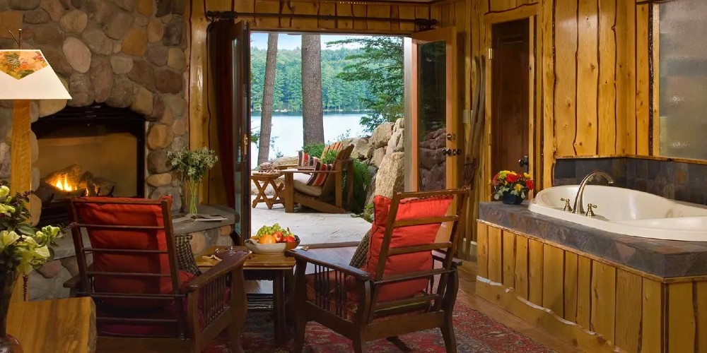 fern-lodge-adirondacks-new-york-rustic-suite-overlooking-lake-family-traveller-2022