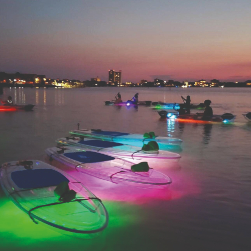 kids-sailing-glow-kayaks-after-dark-pensacola-fun-florida-family-vacations-2022