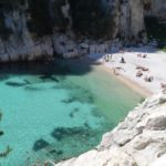 plage-den-vau-beach-with-sunbathers-best-beaches-in-france-family-traveller-us-2022