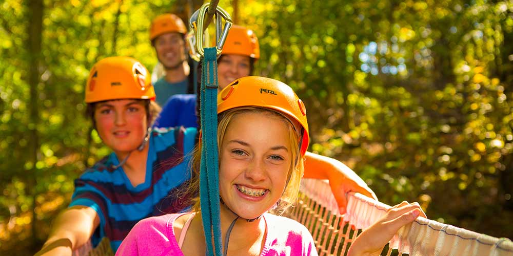 kids-ziplining-at-explorer-park-gatineau-on-family-vacations-in-ottawa-canada