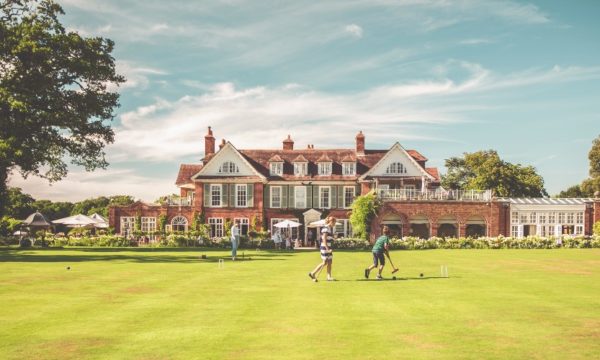 kids-playing-croquet-front-lawn-chewton-grange-hotel-dorset-england-family-traveller-accommodation-guide-2022