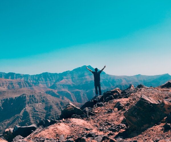 hiker-exuberant-on-top-of-jais-jebel-ras-al-kaimah