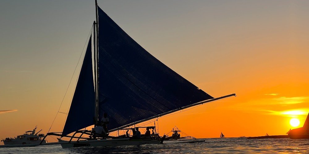 sunset-sailing-philippines-edward-ang-unsplash