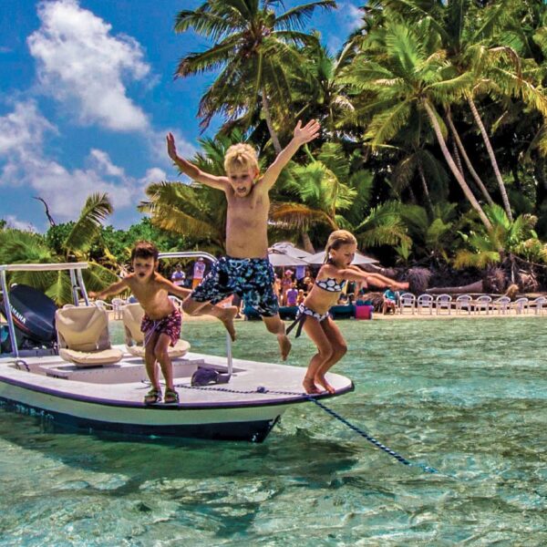 children-jumping-off-boat-seychelles-family-holidays
