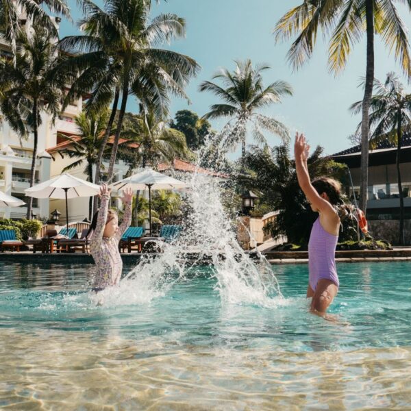 children-playing-in-pool-hilton-bali-resort